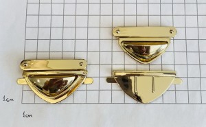 Замок для сумки. Золото 51х33 мм