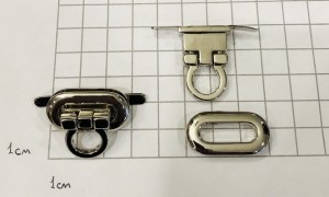 Замок для сумки. Никель 30х15 мм