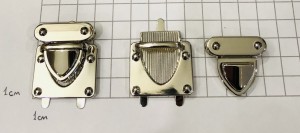 Замок для сумки. Никель 33х37 мм