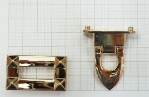 Замок для сумки. Золото 41х23 мм